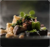 The finished dish with its herbs, close up.